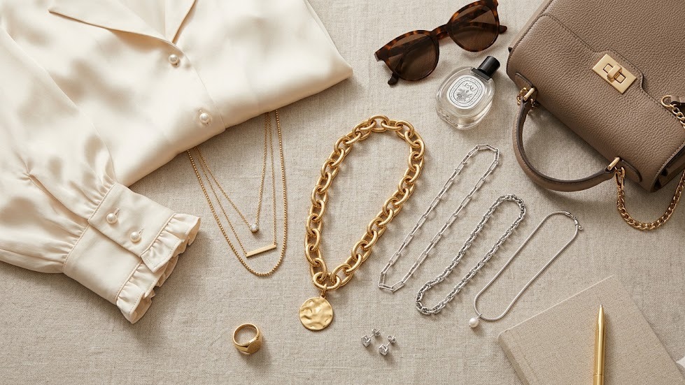 luxury chain necklace essentials arranged to show elegant women's jewelry styling